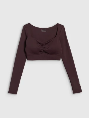 4F Crop top treningowy z niskim wsparciem damski 4F x Anna Lewandowska - brązowy S