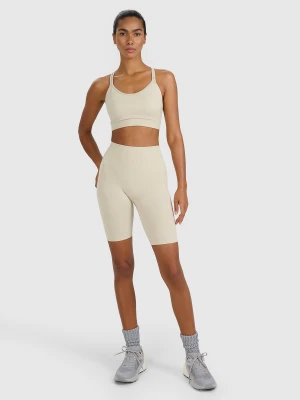 4F Legginsy kolarki treningowe bezszwowe damskie - beżowe XS/S