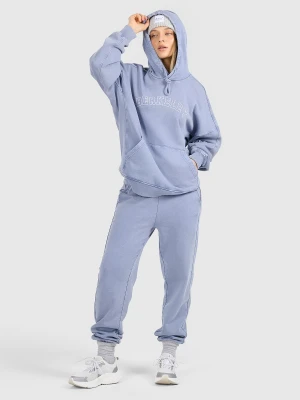 4F Spodnie dresowe joggery damskie - niebieskie M