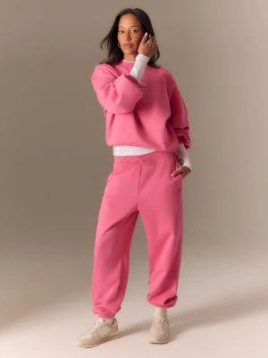 4F Spodnie dresowe joggery damskie - różowe M