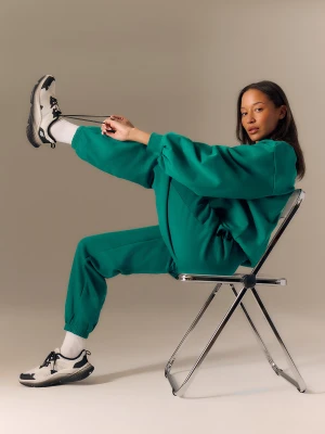 4F Spodnie dresowe joggery damskie - zielone XS