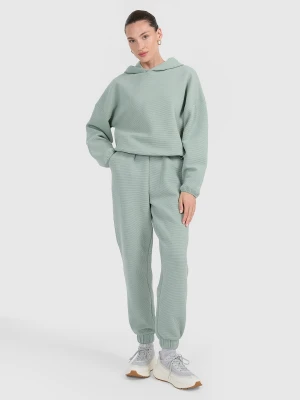 4F Spodnie dresowe z waflowej dzianiny damskie - turkusowe L