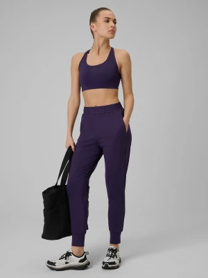 4F Spodnie treningowe szybkoschnące damskie - fioletowe XS