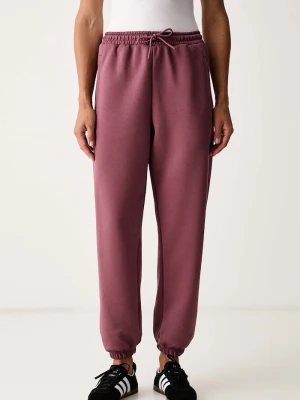 adidas by Stella McCartney spodnie joggery damskie z bawełną bordowy
