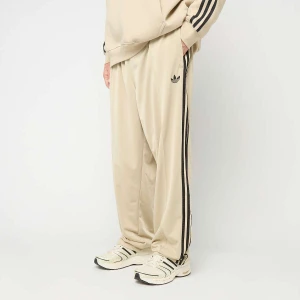 adidas Originals Firebird Adicolor Baggy Fit Trackpants mężczyźni Spodnie dresowe beż rozmiar Odzież