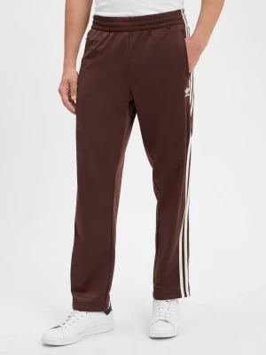 adidas Originals Męskie spodnie dresowe - Firebird Mężczyźni brązowy jednolity,