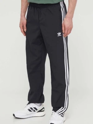 adidas Originals spodnie Adicolor Woven Firebird męskie kolor czarny wzorzyste IT2501