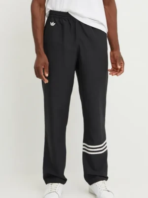 Zdjęcie produktu adidas Originals spodnie dresowe Adicolor kolor czarny z aplikacją IW0977