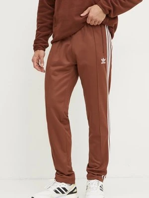 Zdjęcie produktu adidas Originals spodnie dresowe Beckenbauer Track Pants kolor brązowy z aplikacją IY9877