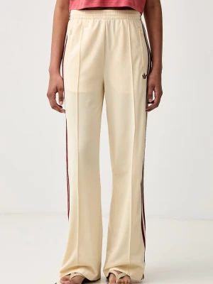 adidas Originals spodnie dresowe damskie Firebird żółty