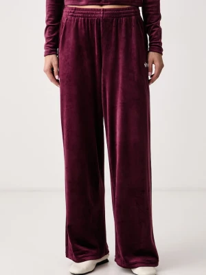 adidas Originals spodnie dresowe damskie welurowe Essentials Velour bordowy