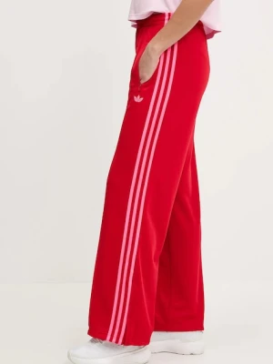 adidas Originals spodnie dresowe Firebird damskie kolor czerwony wzorzyste JW1225