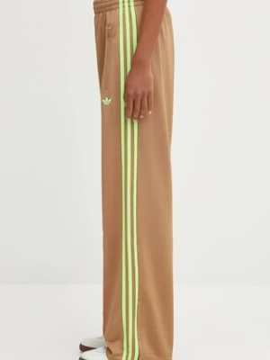adidas Originals spodnie dresowe Firebird Tp damskie kolor zielony gładkie JW1230
