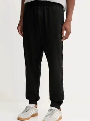 adidas Originals spodnie dresowe Sst Tp męskie kolor czarny gładkie JY1285