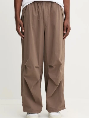 adidas Originals spodnie Ess Parachute brązowy