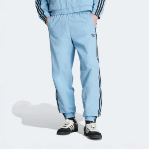 adidas Originals Spodnie treningowe adicolor Firebird mężczyźni dresowe niebieski rozmiar Odzież