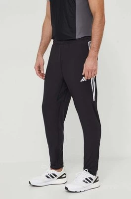 adidas Performance spodnie do biegania Own the Run kolor czarny z nadrukiem IK4982