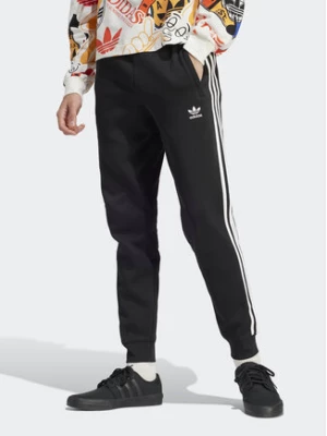 adidas Spodnie dresowe adicolor 3-Stripes IU2353 Czarny Slim Fit