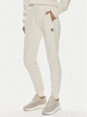 adidas Spodnie dresowe adicolor Essentials IA6477 Beżowy Slim Fit