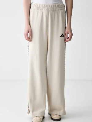adidas spodnie dresowe damskie z bawełną Leopard Pack beżowy