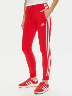 adidas Spodnie dresowe Essentials 3-Stripes IY1719 Czerwony Slim Fit