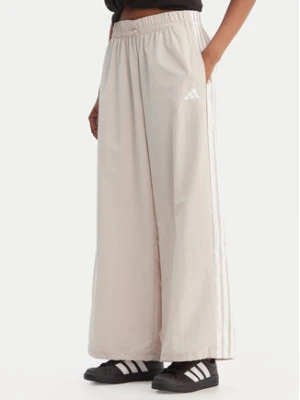 adidas Spodnie dresowe Essentials 3-Stripes JC8168 Beżowy Loose Fit