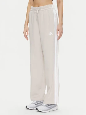 adidas Spodnie dresowe Essentials 3-Stripes JW9215 Beżowy Regular Fit