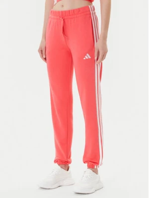 adidas Spodnie dresowe Essentials 3-Stripes KE4387 Koralowy Regular Fit