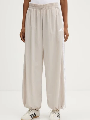 adidas spodnie dresowe Essentials kolor beżowy z aplikacją JC8168