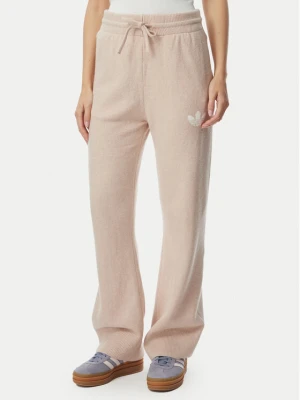adidas Spodnie dresowe Essentials KR9180 Beżowy Loose Fit