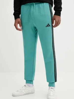 adidas spodnie dresowe Essentials męskie kolor turkusowy z aplikacją JX0711