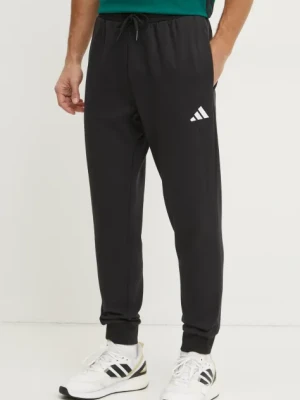 Zdjęcie produktu adidas spodnie dresowe Feelcozy kolor czarny gładkie JE3815