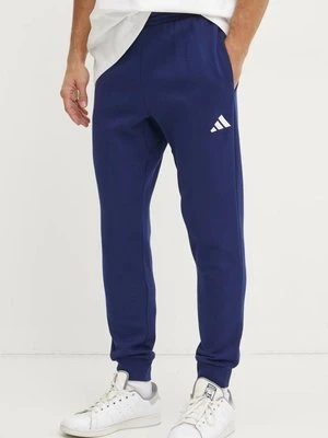 adidas spodnie dresowe Feelcozy kolor granatowy gładkie JE3814