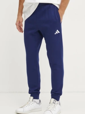 adidas spodnie dresowe Feelcozy kolor granatowy gładkie JE3814