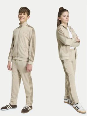 adidas Spodnie dresowe Firebird HZ6652 Beżowy jasny Regular Fit
