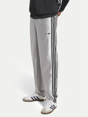 adidas Spodnie dresowe Firebird IA2222 Szary jasny Regular Fit