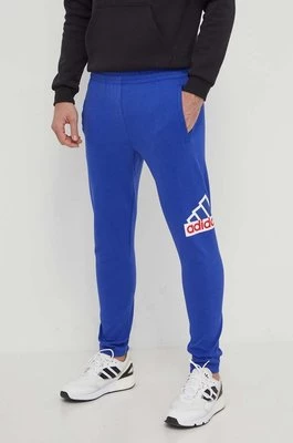 adidas spodnie dresowe kolor niebieski z nadrukiem IS9594