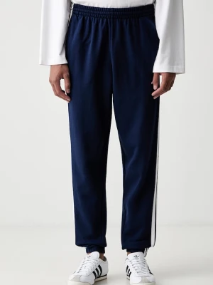 adidas spodnie dresowe męskie bawełniane Essentials granatowy