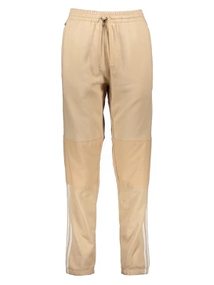 adidas Spodnie dresowe "Parley" w kolorze beżowym rozmiar: XL