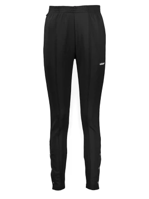 adidas Spodnie dresowe "Slim" w kolorze czarnym rozmiar: 36