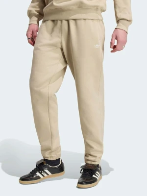 adidas Spodnie dresowe w kolorze beżowym rozmiar: XL