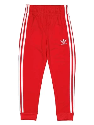 adidas Spodnie dresowe w kolorze czerwonym rozmiar: 134