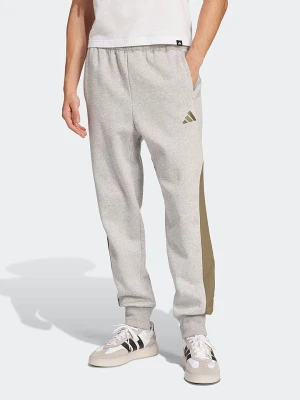 adidas Spodnie dresowe w kolorze szarym rozmiar: L