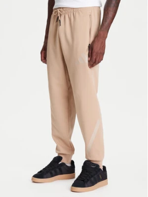 adidas Spodnie dresowe Z.N.E. JW4725 Beżowy Loose Fit