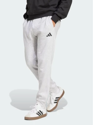 adidas Spodnie dresowe Essentials Feelcozy Fleece JE3819 Szary jasny Regular Fit