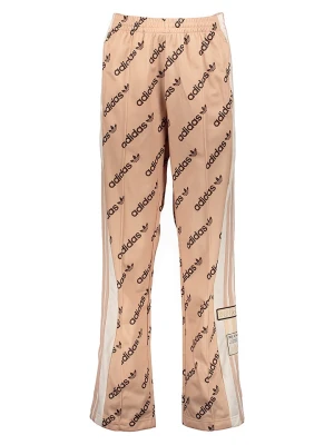 adidas Spodnie sportowe "Adi Break" w kolorze beżowym rozmiar: 34