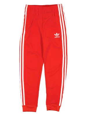 adidas Spodnie sportowe w kolorze czerwonym rozmiar: 140