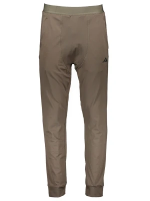 adidas Spodnie sportowe w kolorze jasnobrązowym rozmiar: S