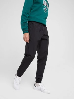 adidas Spodnie Tref Ess Jog Blk Otb**