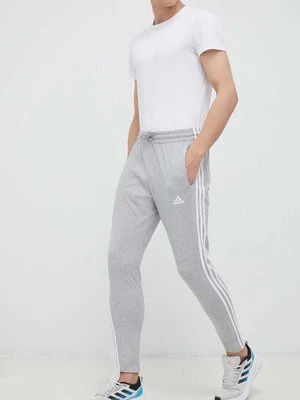 adidas spodnie treningowe Essentials kolor szary melanżowe IC0046